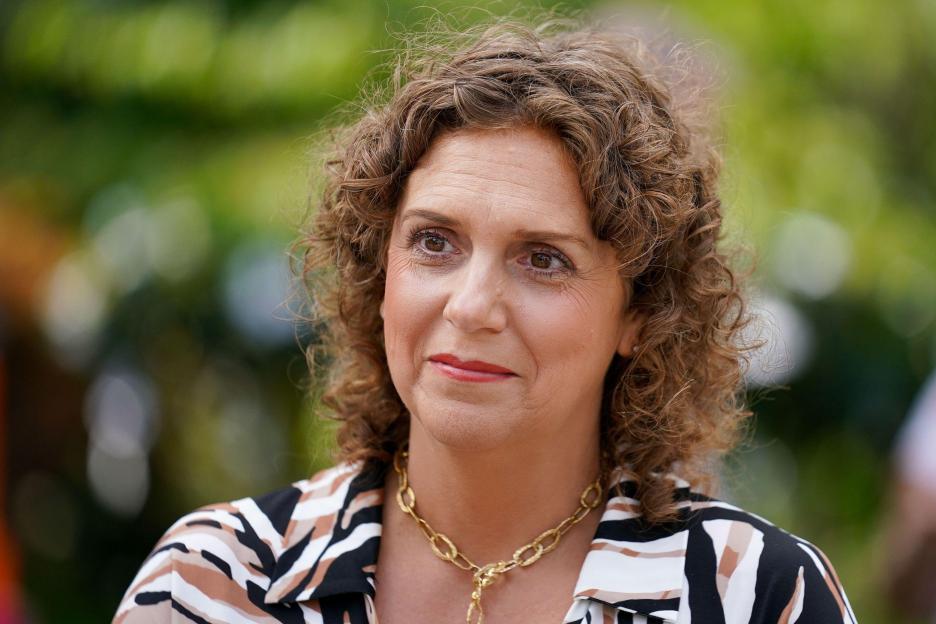 Hannah Ingram-Moore, daughter of Captain Sir Tom Moore, wearing a patterned shirt and gold necklace.