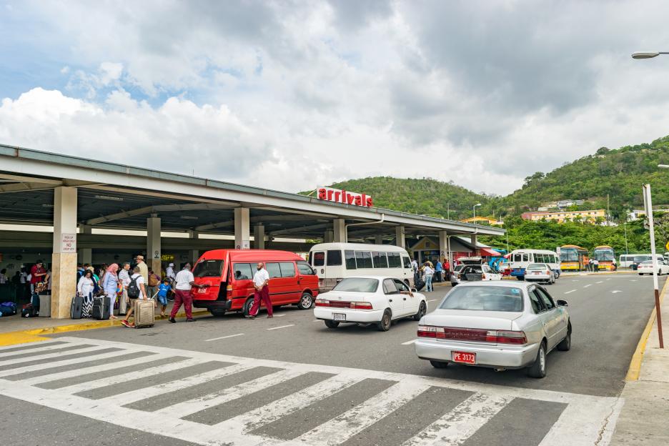 Passengers and vehicles outside Arrivals at MBJ Airport