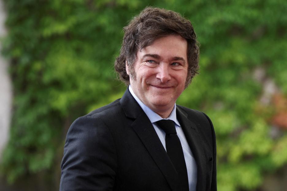Argentine President Javier Milei smiles.