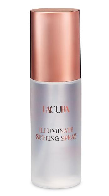 Lacura Illuminate Setting Spray with a rose gold lid and a frosted white bottle.