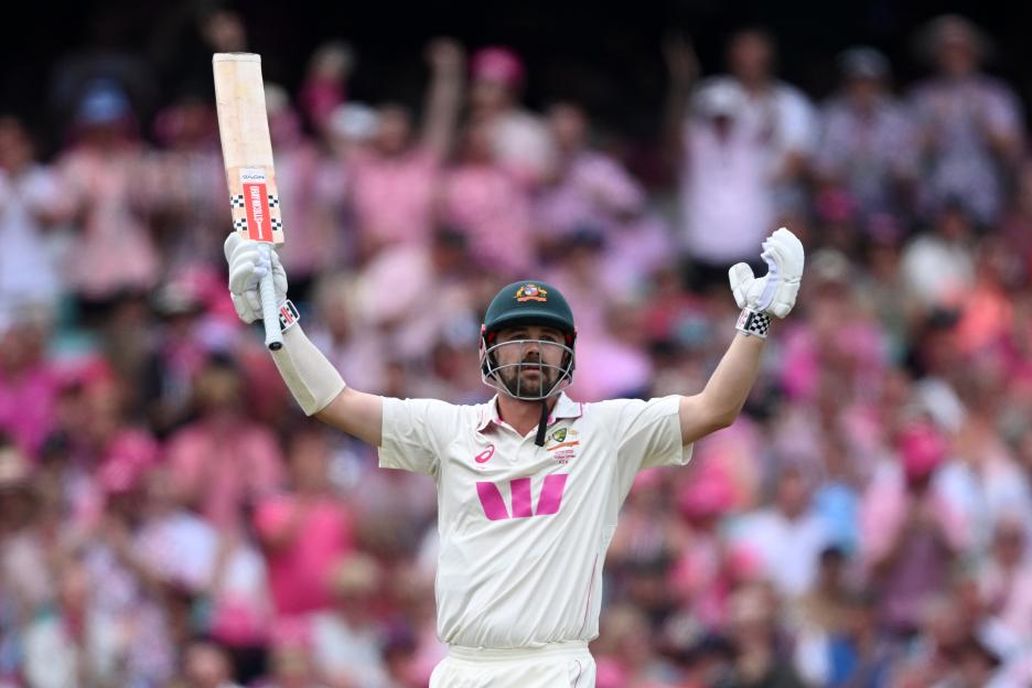 England's Jamie Smith and Harry Brook after a cricket match.