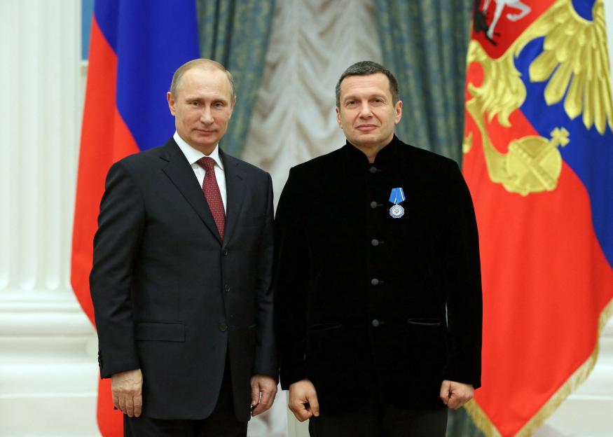 : Russia's President Putin and TV presenter Solovyov attend award ceremony in Moscow
