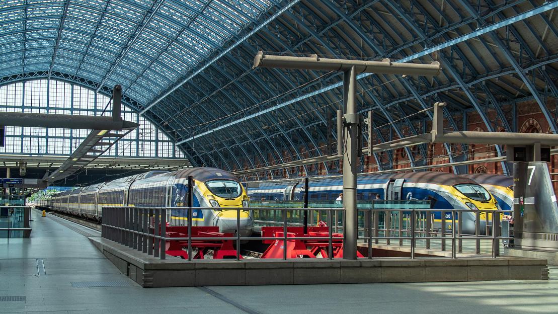 Two Eurostar trains at St Pancras International train terminal.