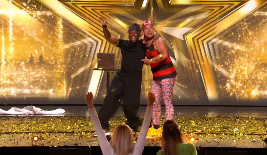 KSI pressing the golden buzzer for Mr Cherry on Britain's Got Talent, celebrated by golden confetti.