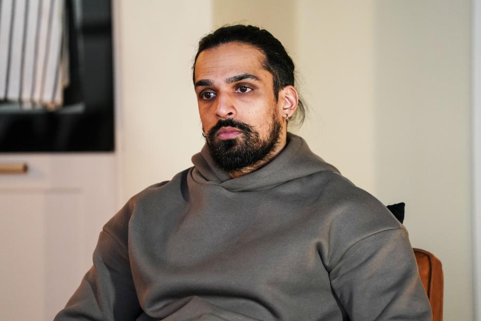 Ravi Gulati in a gray hoodie.