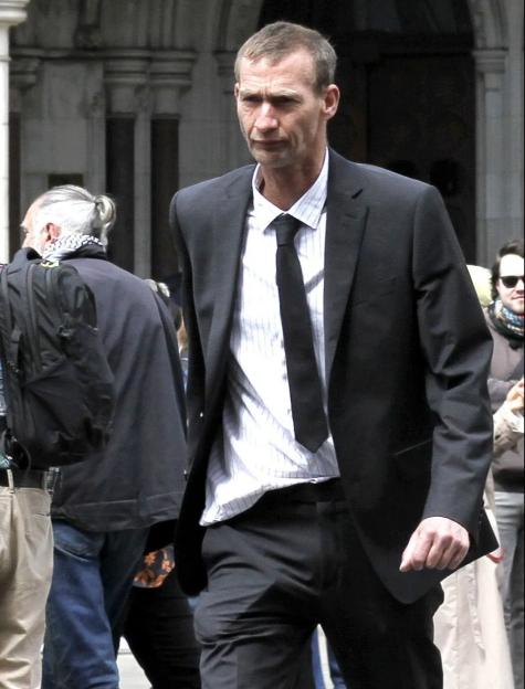 Grant Greening-Steer outside London's High Court during a compensation fight.