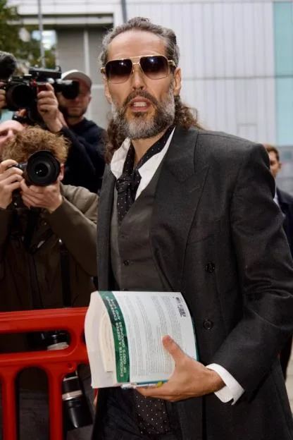 Russell Brand arrives at Southwark Crown Court for his trial.