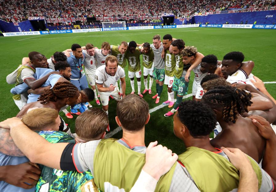 Harry Kane speaks to his England teammates in a huddle after their FIFA World Cup victory.