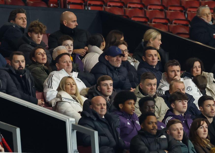 Manchester, England, 23rd January 2026. Left to right: Coleen Rooney, Steve Holland interim assistant head coach of Manchester United, Wayne Rooney and Michael Carrick interim head coach of Manchester United are seen in the stands during the Manchest