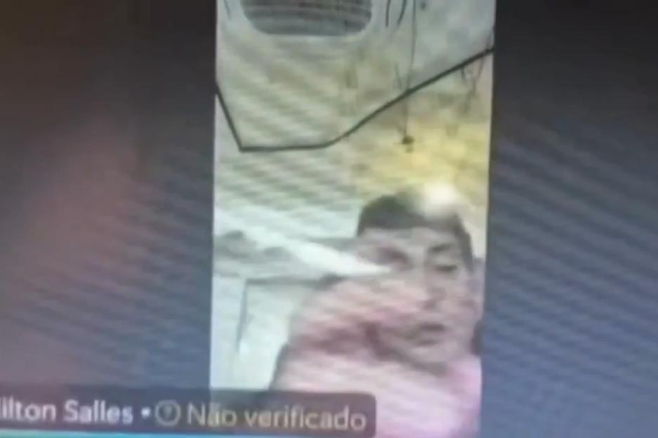 VIDEO: Judge necks wine from bottle and lights cigarette with blowtorch during live hearing