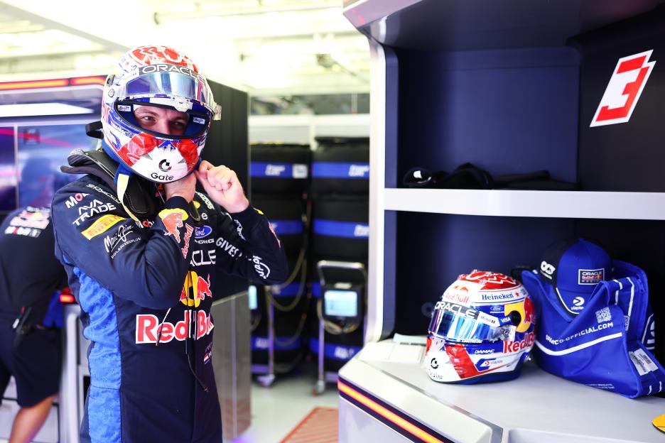 Max Verstappen of Oracle Red Bull Racing in his race suit and helmet, preparing to drive during F1 testing in Bahrain.
