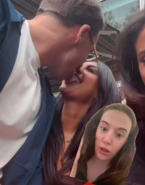 Belle Hassan and a man kissing with another woman in the foreground.
