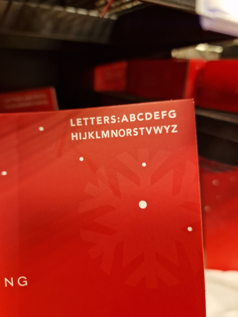 A red box with "LETTERS: ABCDEFG HIJKLMNOPQRSTVVYWZ" printed in white.