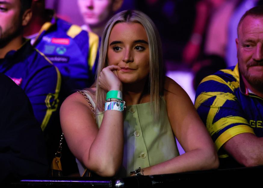 Liverpool, United Kingdom. 23rd Apr, 2026. Luke Littler's girlfriend Faith Millar waits for Luke Littler to walk on ahead Michael van Gerwen v Luke Littler 2026 BetMGM Premier League match at M&S Bank Arena, Liverpool. Picture credit should read: Cod