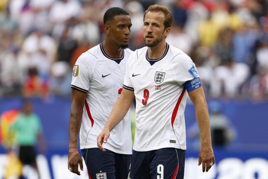England players Ezri Konsa and Harry Kane look dejected during a FIFA World Cup 2026 match.