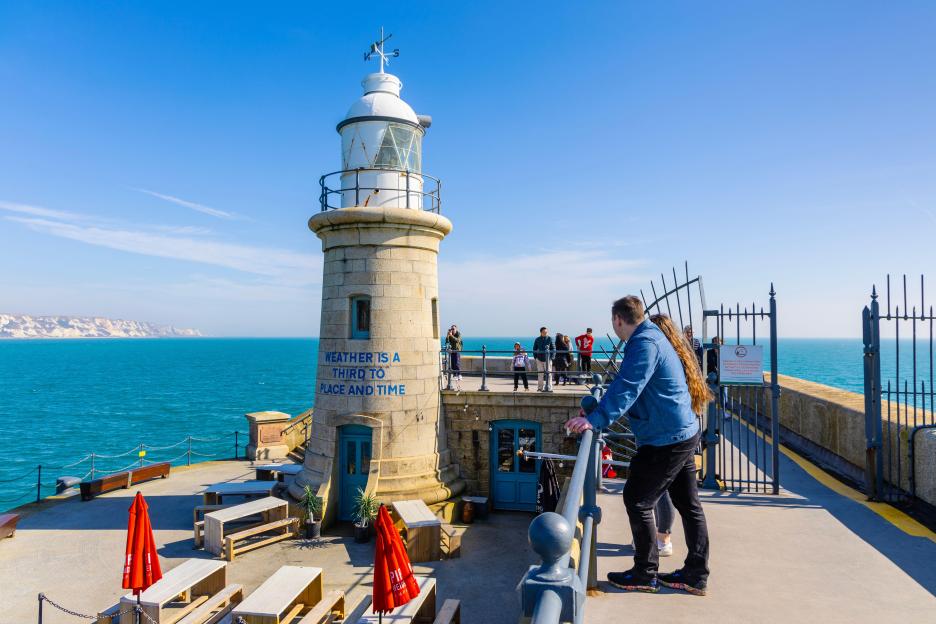 'Discover the Charming English Beach Town with Champagne Lighthouse Bars and Seafront Hot Tubs – So Easy to Reach!'