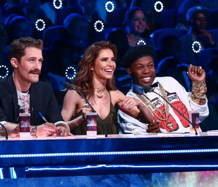 Matthew Morrison, Cheryl, and Todrick Hall sitting at the judges' desk on The Greatest Dancer.