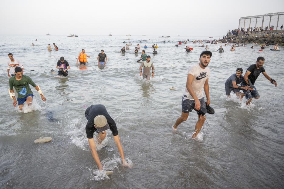 Hundreds of migrants reach Spain's Ceuta after swimming from Morocco