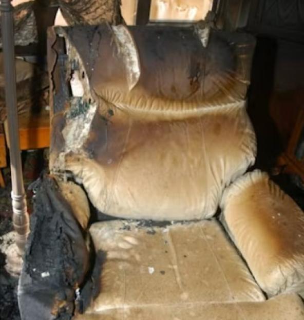 Fire-damaged armchair.