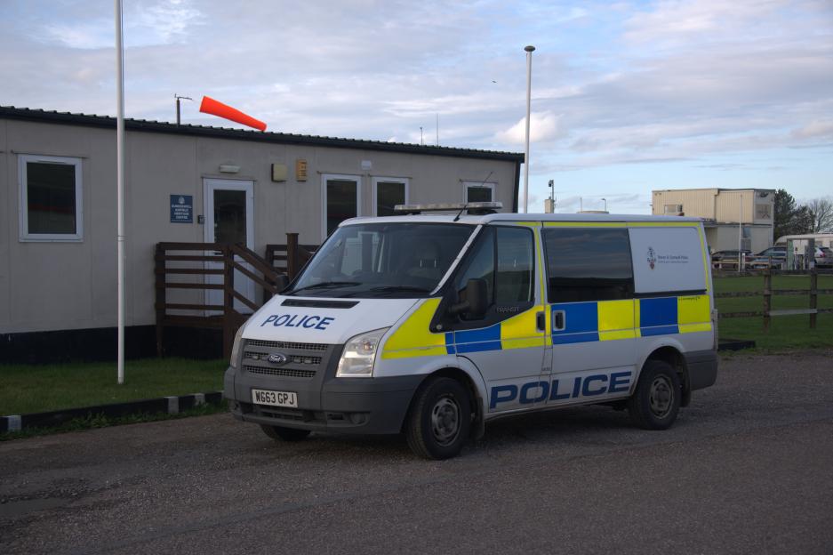 Police van at Dunkeswell Aerodrome near Honiton, East Devon.