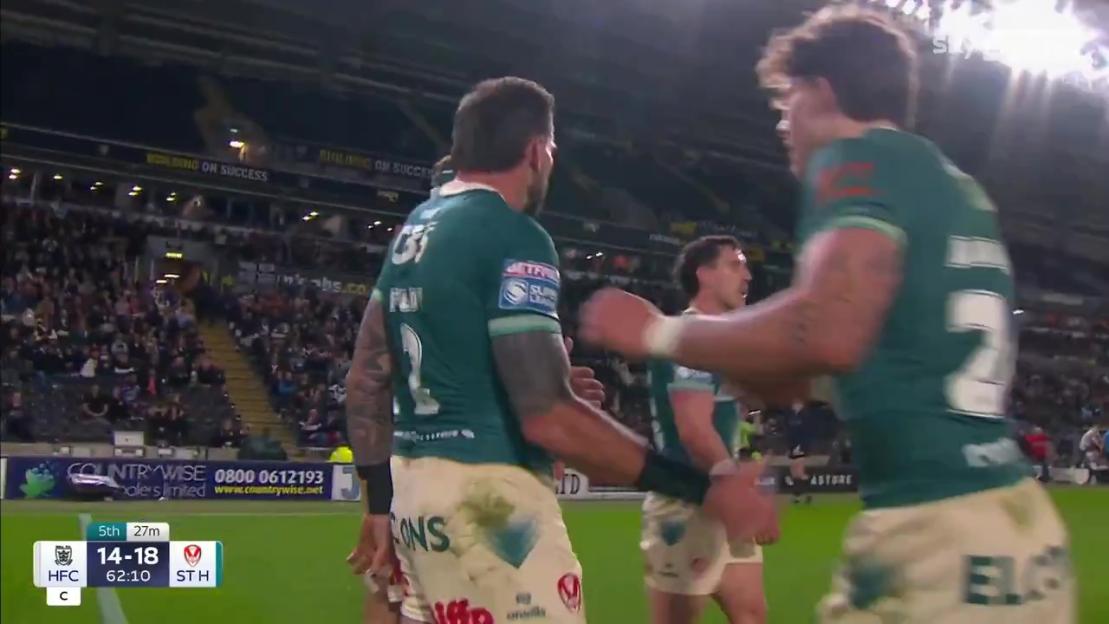 Rugby league star helps up a camera operator who fell on live TV.