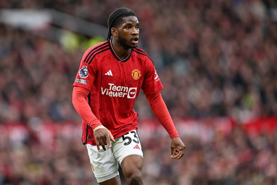 Willy Kambwala of Manchester United in action, wearing a red jersey with number 53.