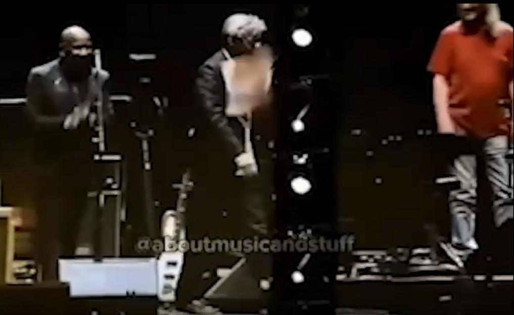 'Unbelievable Moment: Eric Clapton Hit by a Flying Vinyl During Surprise Gig Interruption!'