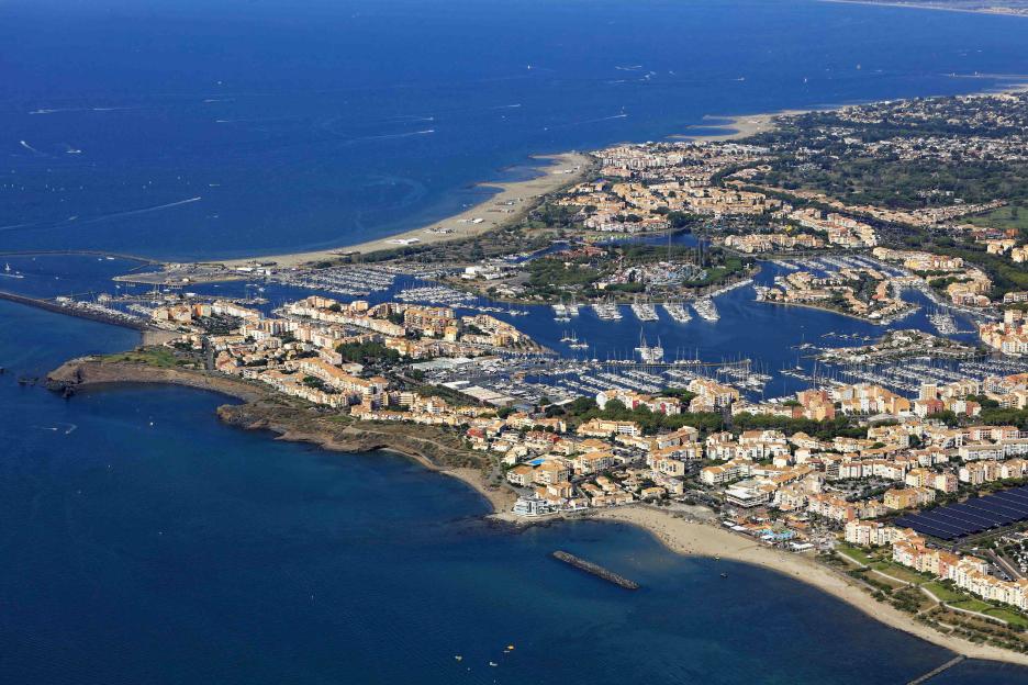 Aerial view of Le Cap d'Agde seaside resort and marina.