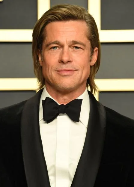 Actor Brad Pitt wearing a tuxedo and bow tie.