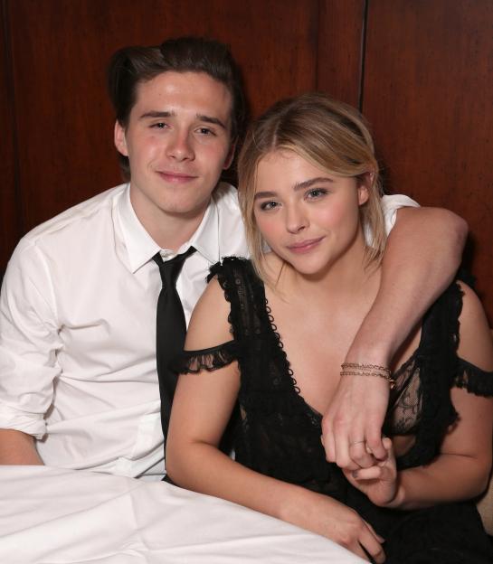 Brooklyn Beckham with his arm around Chloe Grace Moretz at the Neighbors 2 after-party.