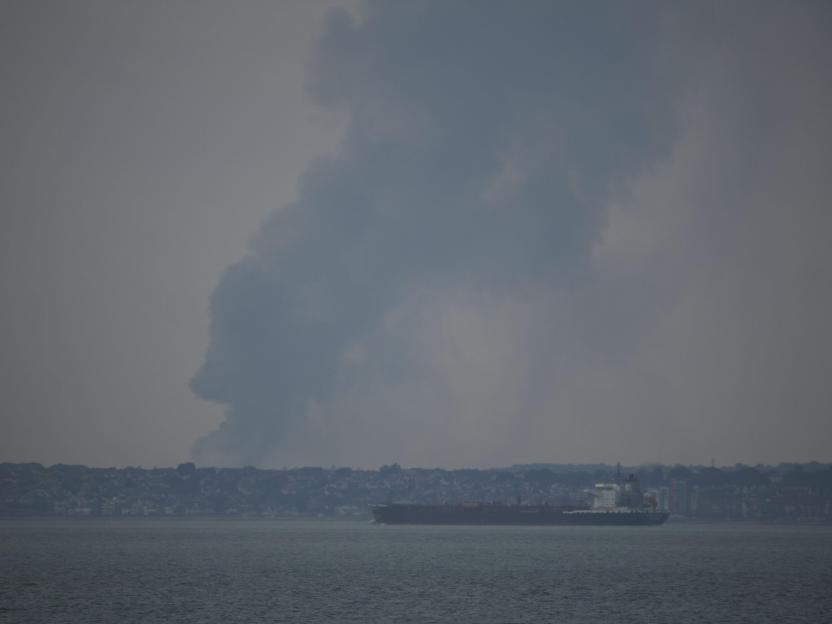 Smoke from a huge explosion in Essex, England, seen from across the water in Kent.