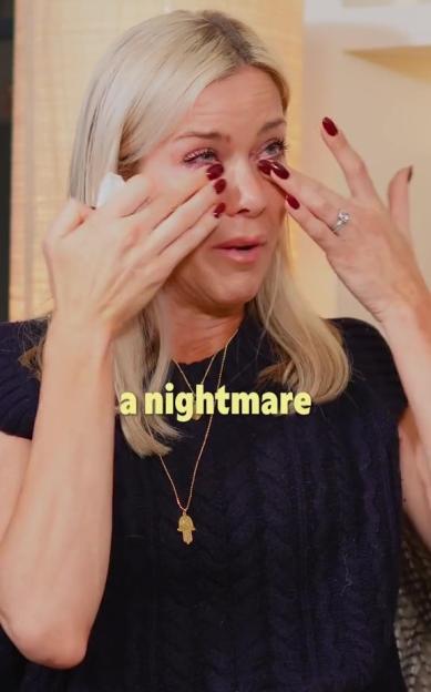 Kate Lawler crying and wiping tears from her eyes.
