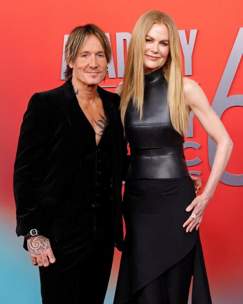Keith Urban and Nicole Kidman pose together on the red carpet.