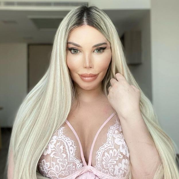 Jessica Alves in a light pink lace bralette.