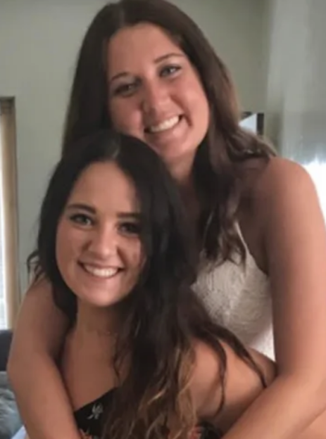 Alyssa Stout and her 'maids of honour' (cardboard cutouts of her deceased sister and best friend).