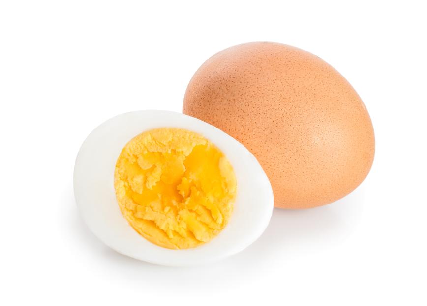 A whole boiled egg and a half-boiled egg with a visible yolk, against a white background.