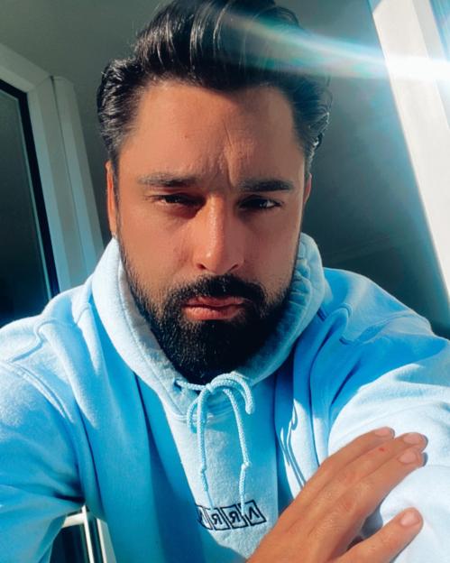 Bob Voysey in a light blue hoodie.