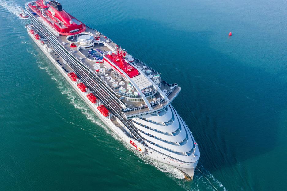 Scarlet Lady is a cruise ship operated by Virgin Voyages. Scarlet Lady arriving at Portsmouth International Port on a sunny morning.