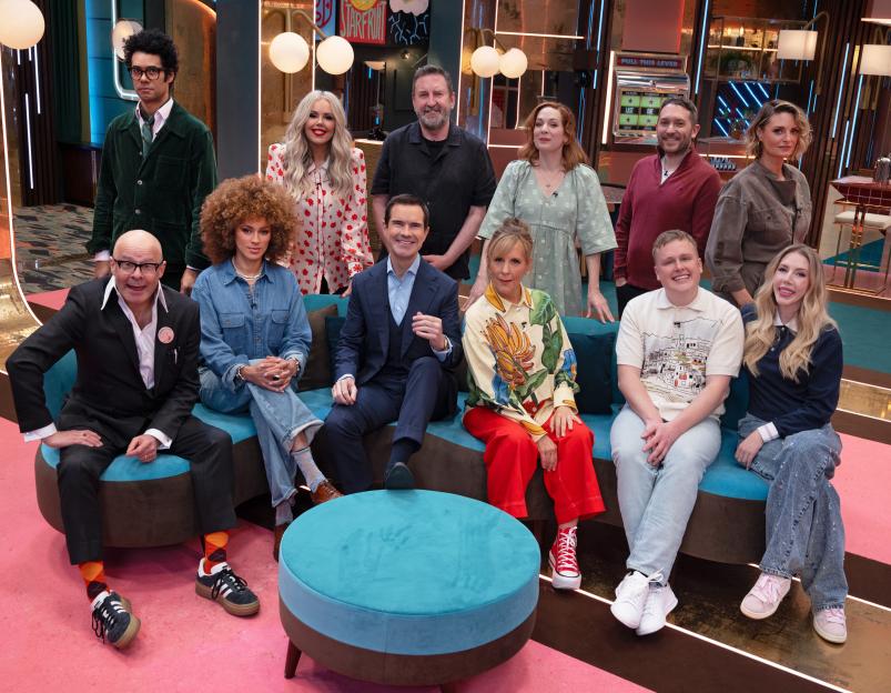The cast of Last One Laughing Season 3 pose together on a colorful set.