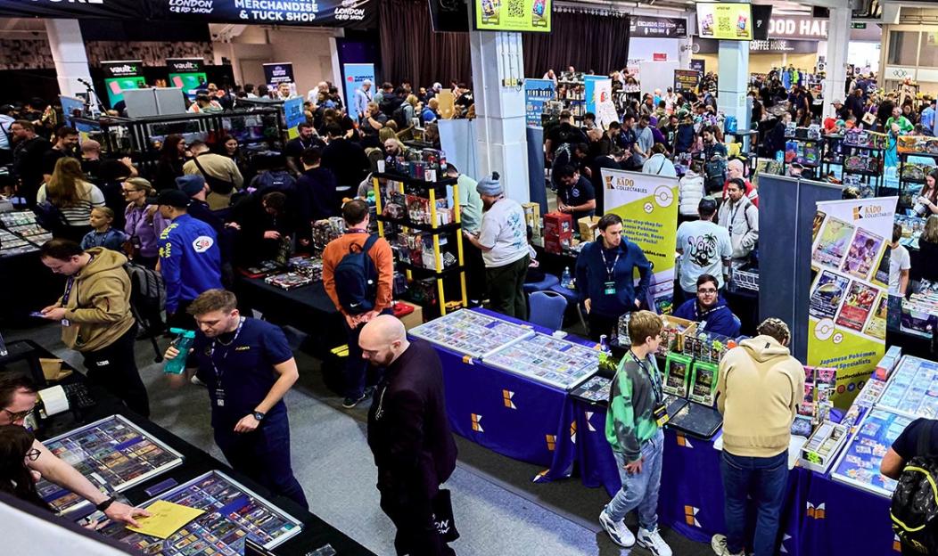 Attendees at the London Card Show looking at trading cards and merchandise.