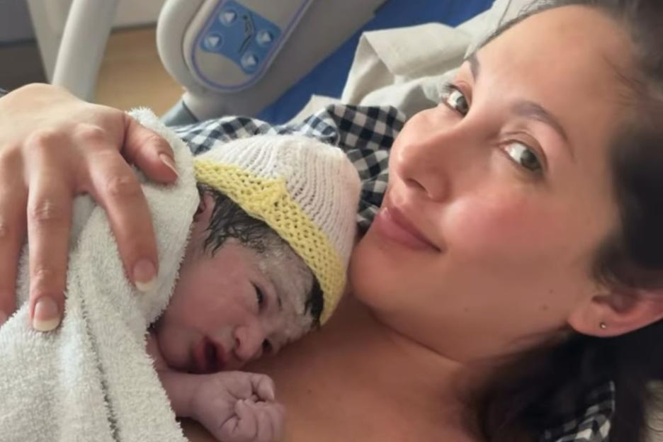 An image collage containing 1 images, Image 1 shows Talitha Minnis cradling her newborn baby on her chest