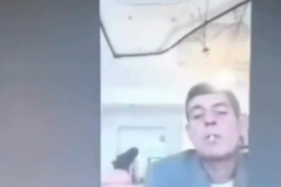 VIDEO: Judge necks wine from bottle and lights cigarette with blowtorch during live hearing