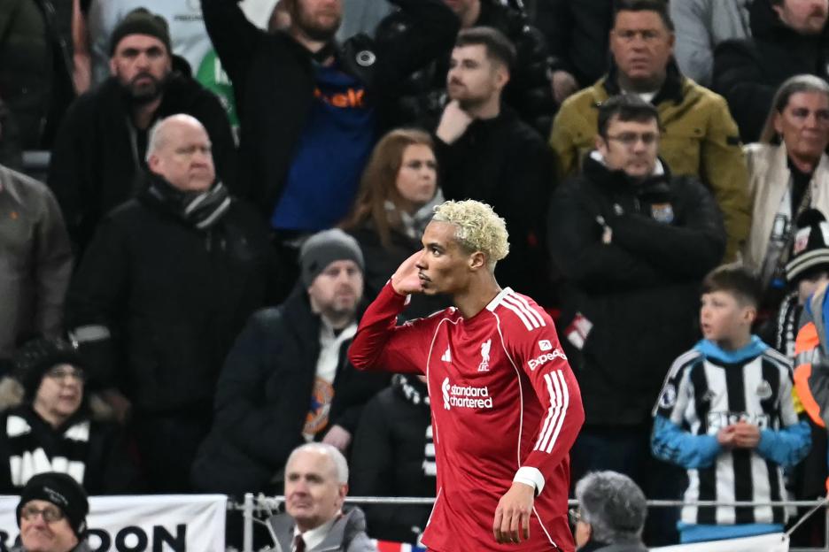 Liverpool's Hugo Ekitike celebrating after scoring a goal during a football match.