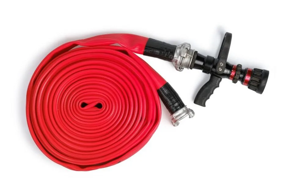 A red rolled firefighter hose with a nozzle attached on a white background.