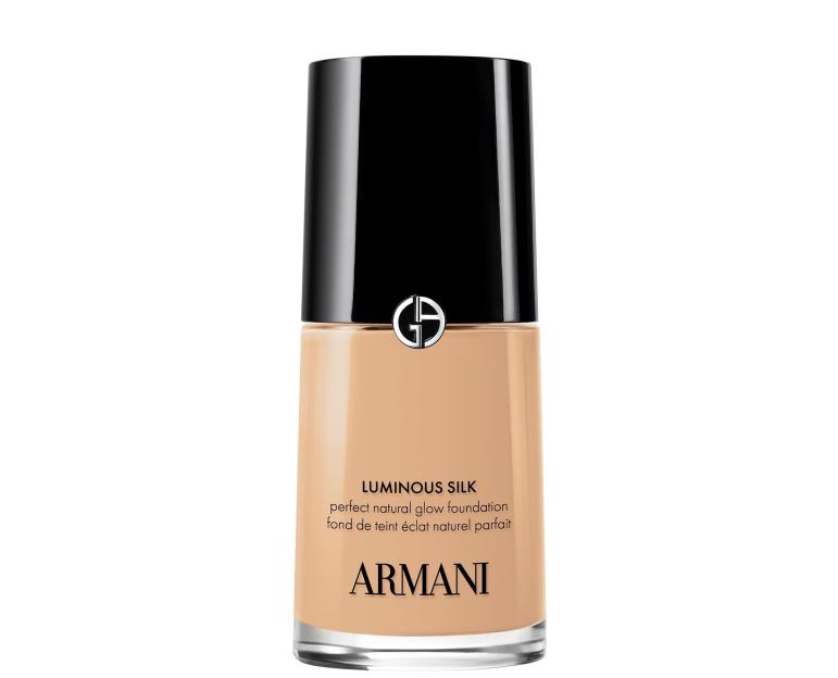 Armani Luminous Silk Foundation in a light beige shade, with a black cap and the Armani logo.