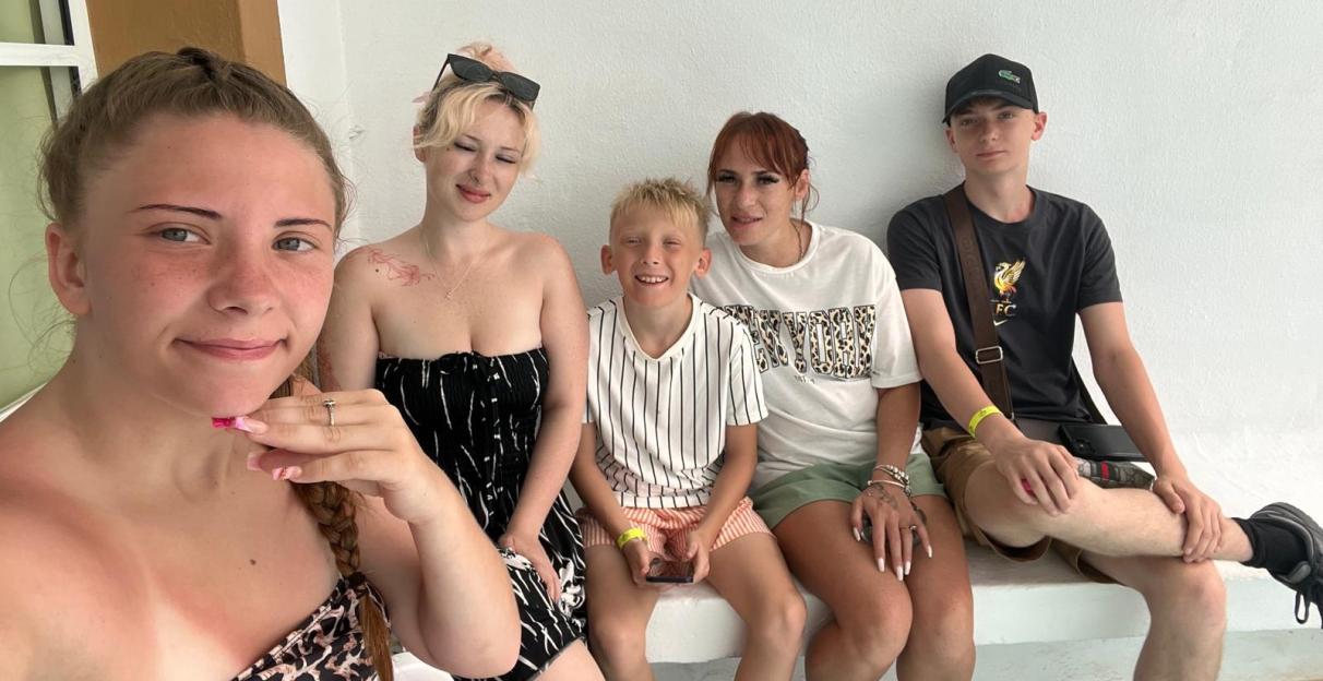 Hannah Hall with her children on holiday.