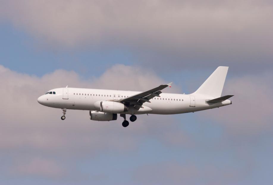 Airbus A320 civil aircraft in flight.