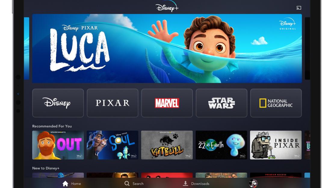 Screenshot of the Disney+ app interface on a tablet, featuring movie and series selections.