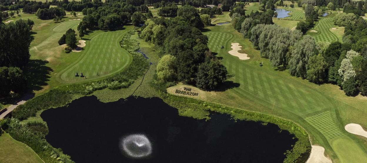 Aerial view of the Brabazon golf course with a large lake.