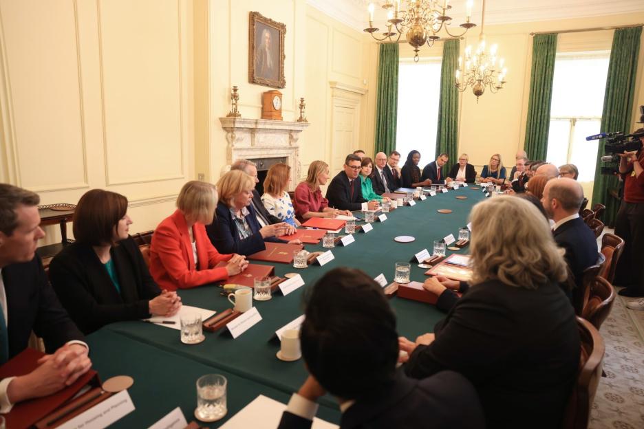 UK Prime Minister Andy Burnham and his ministers during his first cabinet meeting at 10 Downing Street.